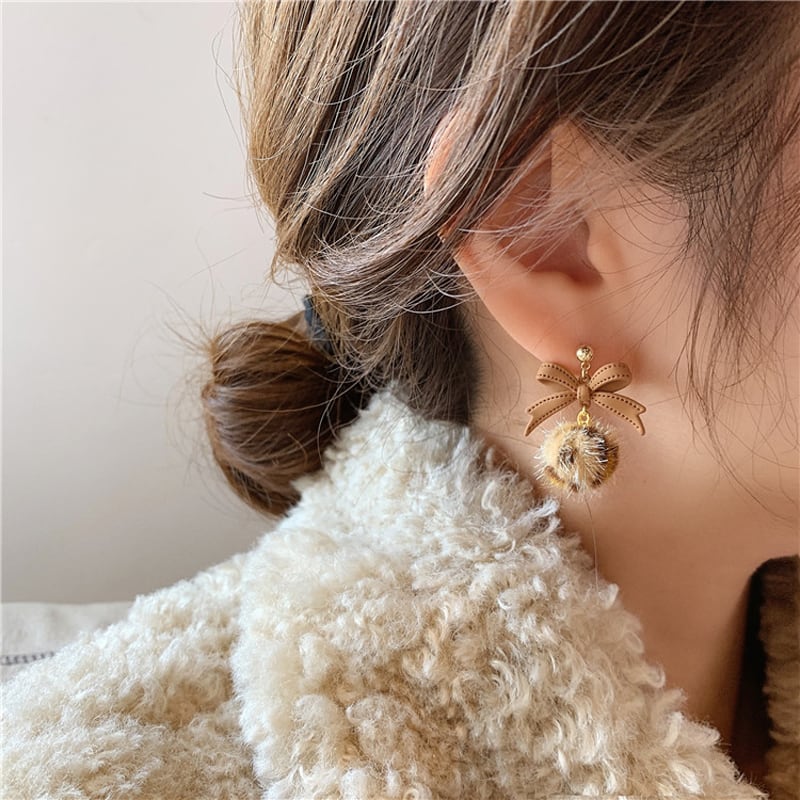 【QCWリーズ】可愛い豹柄リボンピアス 耳飾り 小物 個性的 ペア合わせやすい