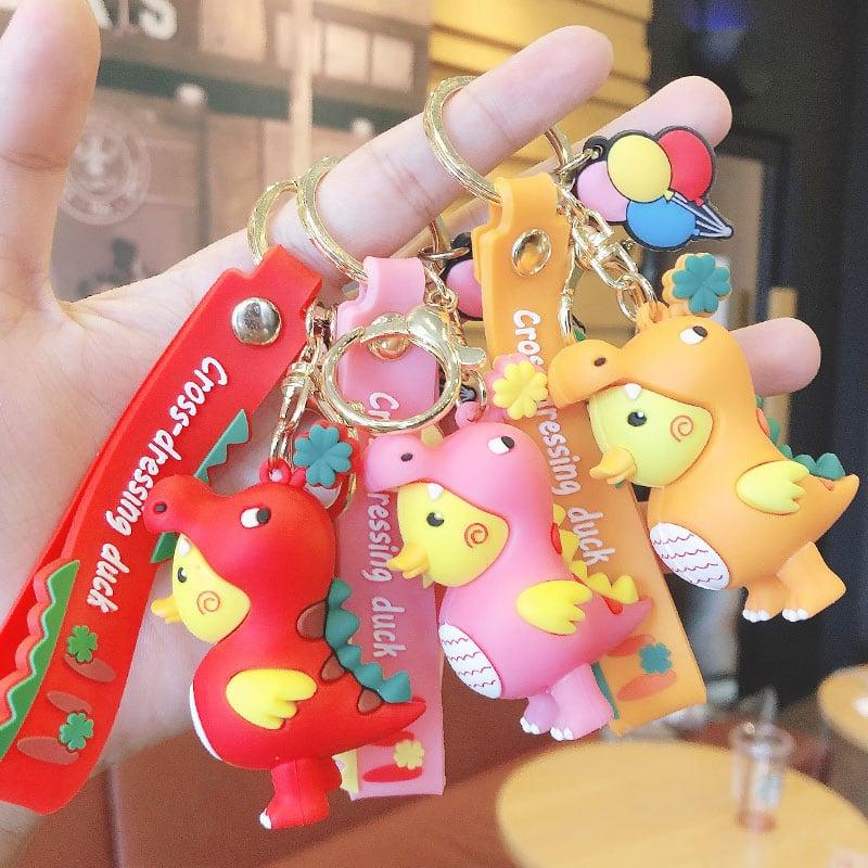 【MEIMEIシリーズ】★キーホルダー★ 3COLOR オレンジORピンクOR赤 恐竜に変身するダック 超可愛い - ChinChic